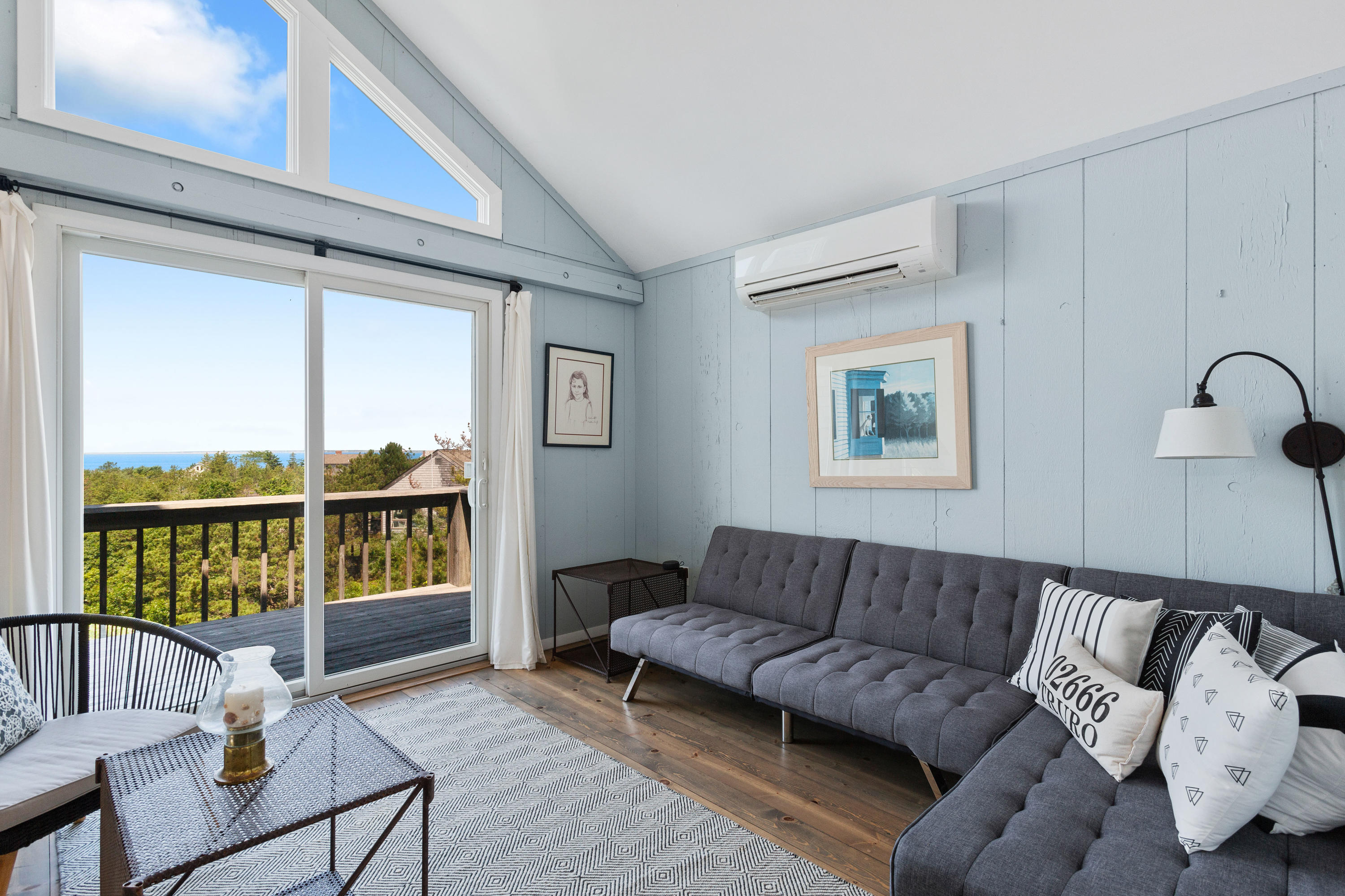 5 High Ridge Road Truro, MA 02666 - Photo 21 of 45 a living room with furniture and a window
