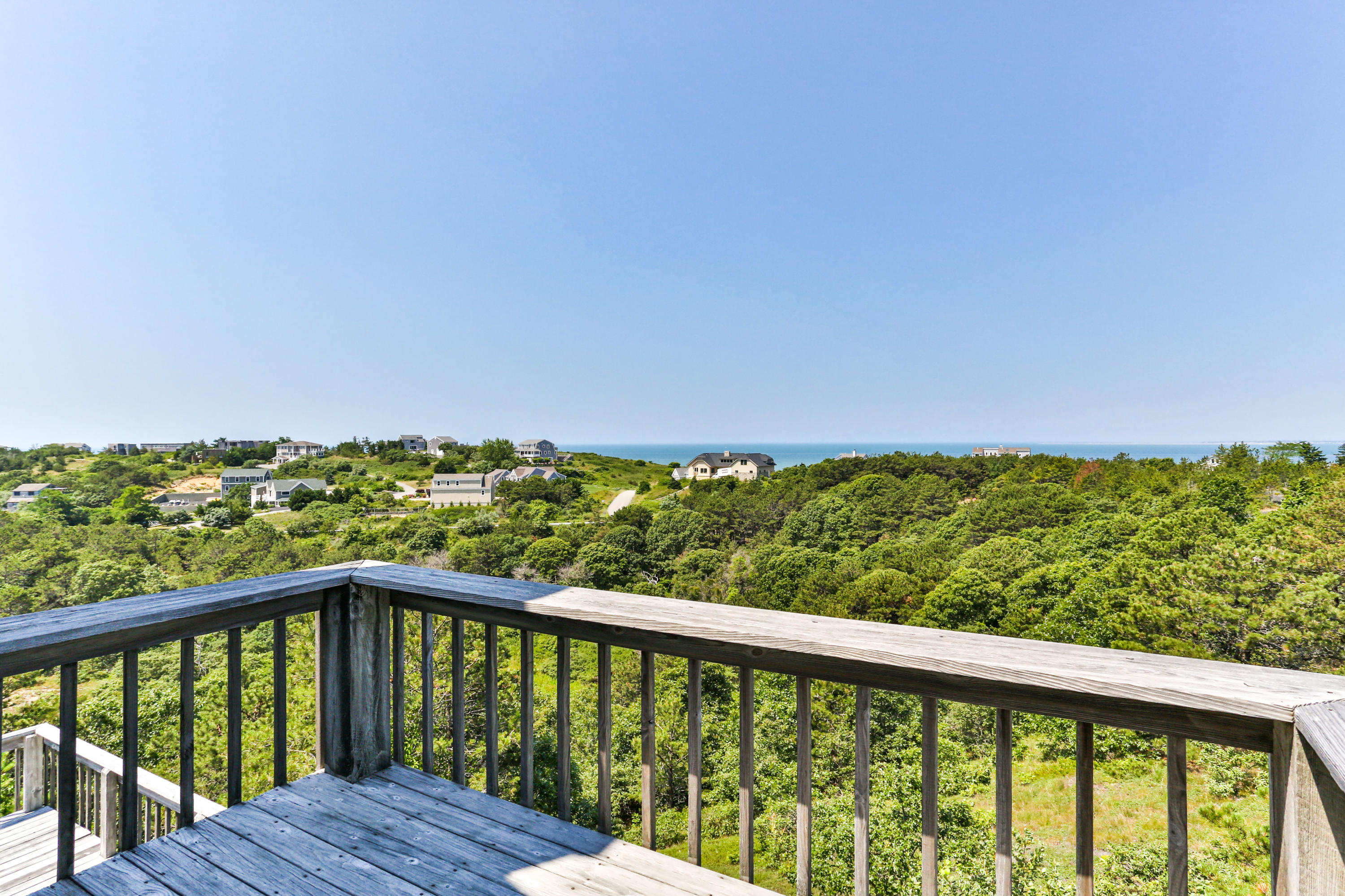 5 High Ridge Road Truro, MA 02666 - Photo 24 of 45 a view of a balcony with an ocean