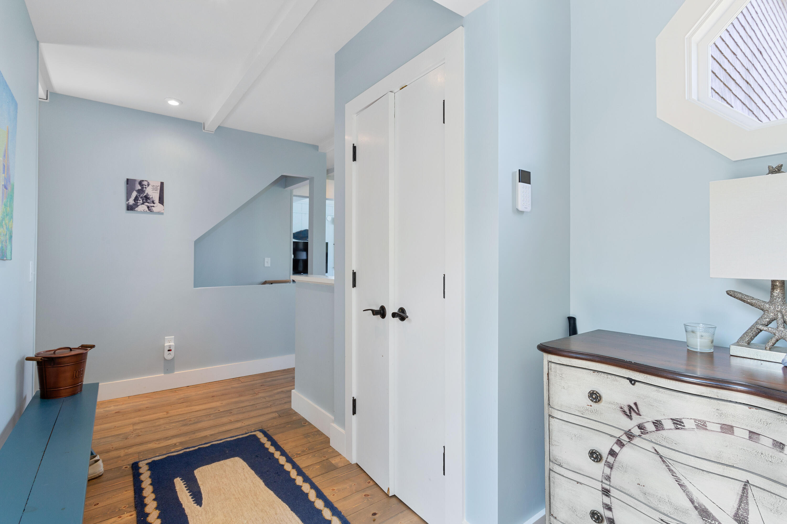 5 High Ridge Road Truro, MA 02666 - Photo 3 of 45 a view of a hallway to a livingroom with furniture