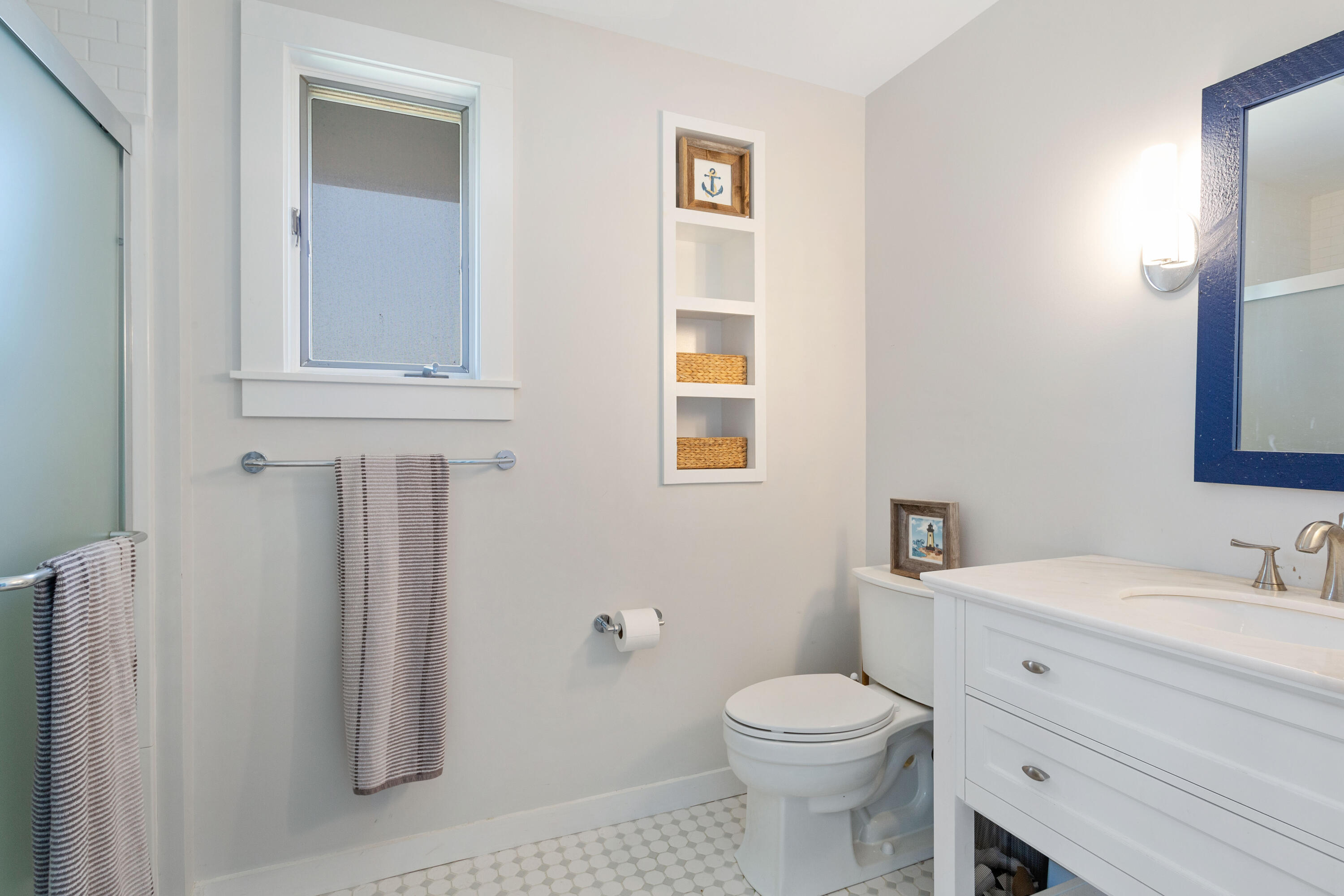 5 High Ridge Road Truro, MA 02666 - Photo 32 of 45 a bathroom with a sink mirror vanity and toilet
