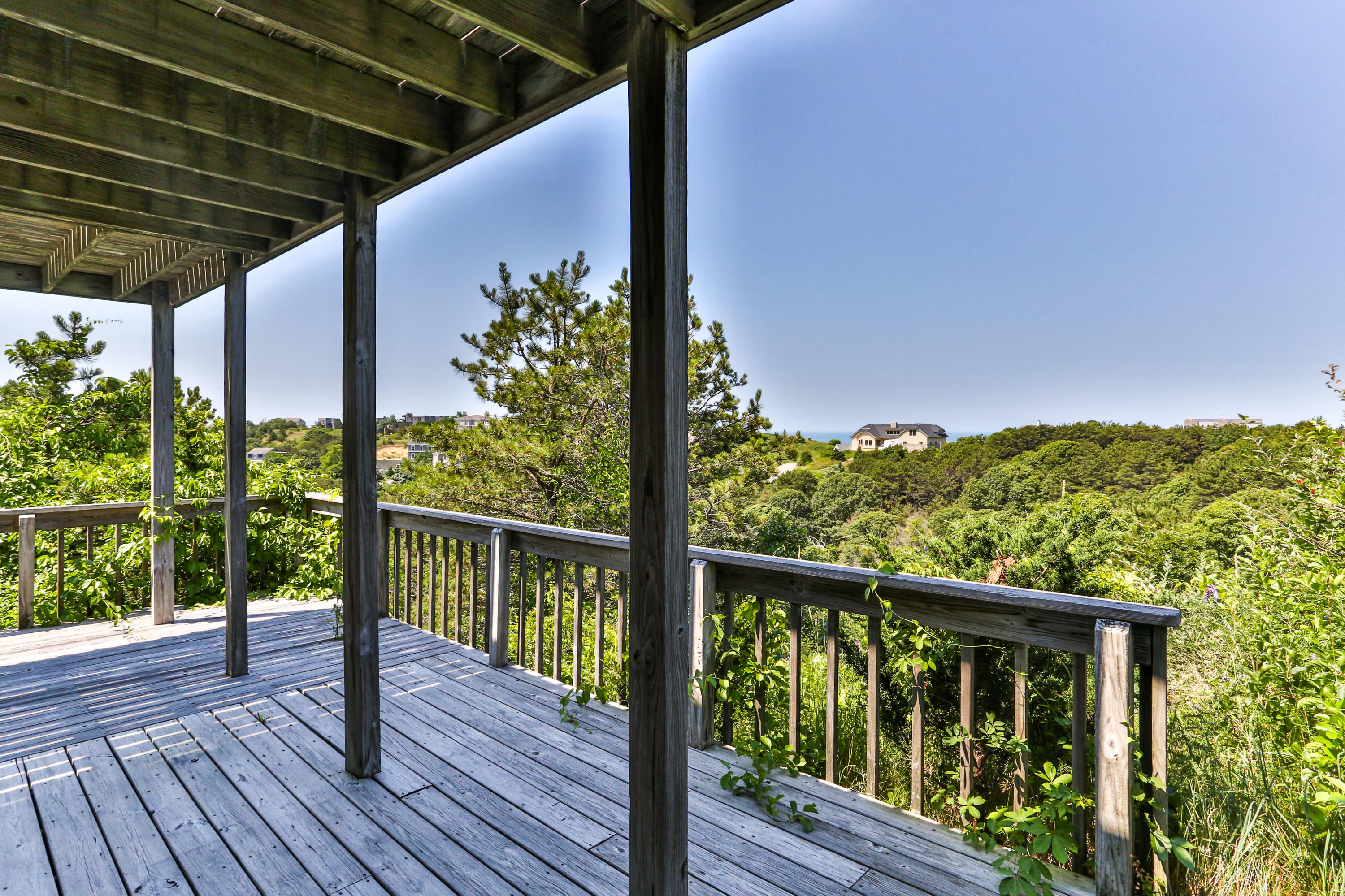 5 High Ridge Road Truro, MA 02666 - Photo 38 of 45 a view of a balcony with wooden floor