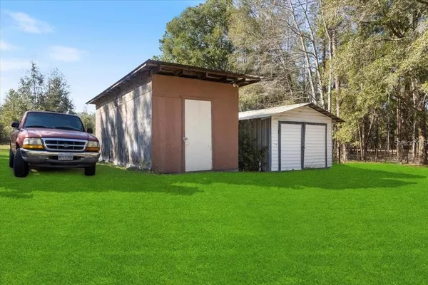 front view of house with a yard