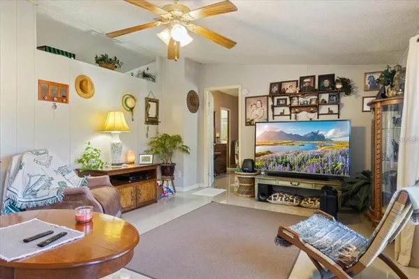 a kitchen with granite countertop a refrigerator and a stove
