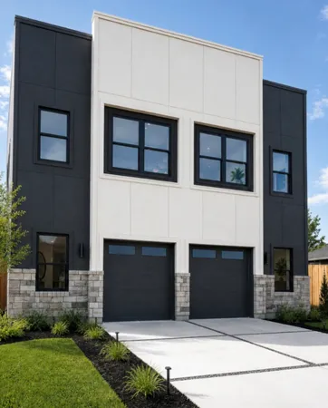 a front view of a house with yard