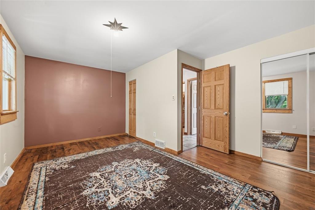 108 Connoquenessing School Road Connoquenessing, PA 16027 - Photo 19 of 50 a view of a room with wooden floor and window