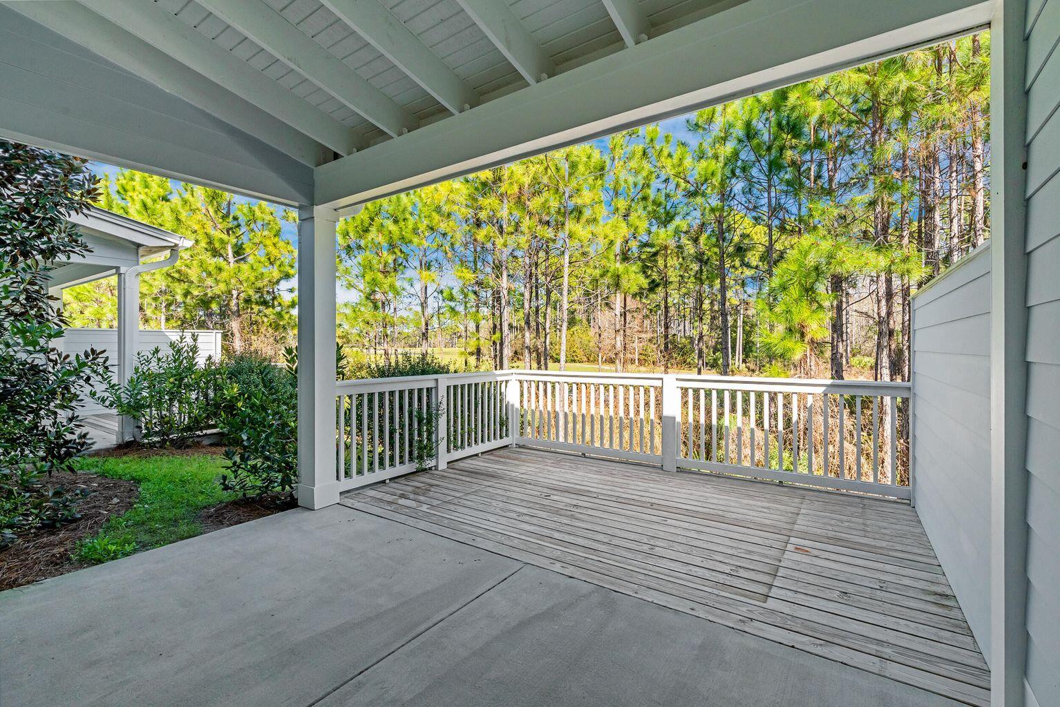75 Golden Bell Ct Inlet Beach, Unit D Inlet Beach, FL 32461 - Photo 3 of 32 a view of a porch with wooden fence