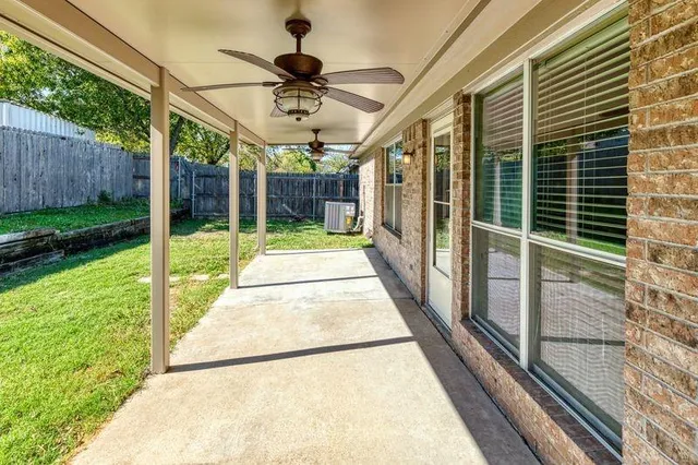 a view of a porch with a backyard
