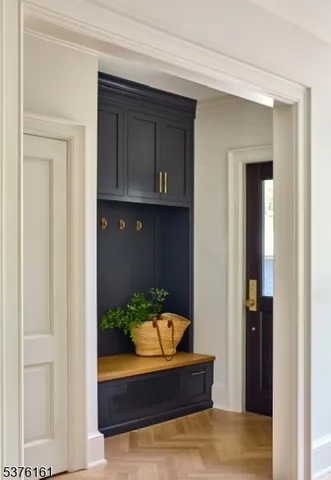 a bedroom with a bed and a potted plant