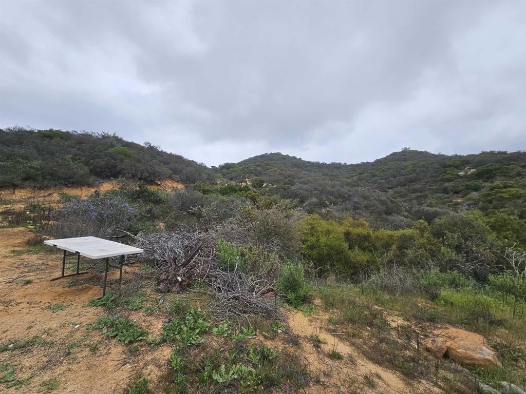 6465 Rainbow Heights Road Fallbrook, CA 92028 - Photo 35 of 36 a view of a lake with mountains in the background