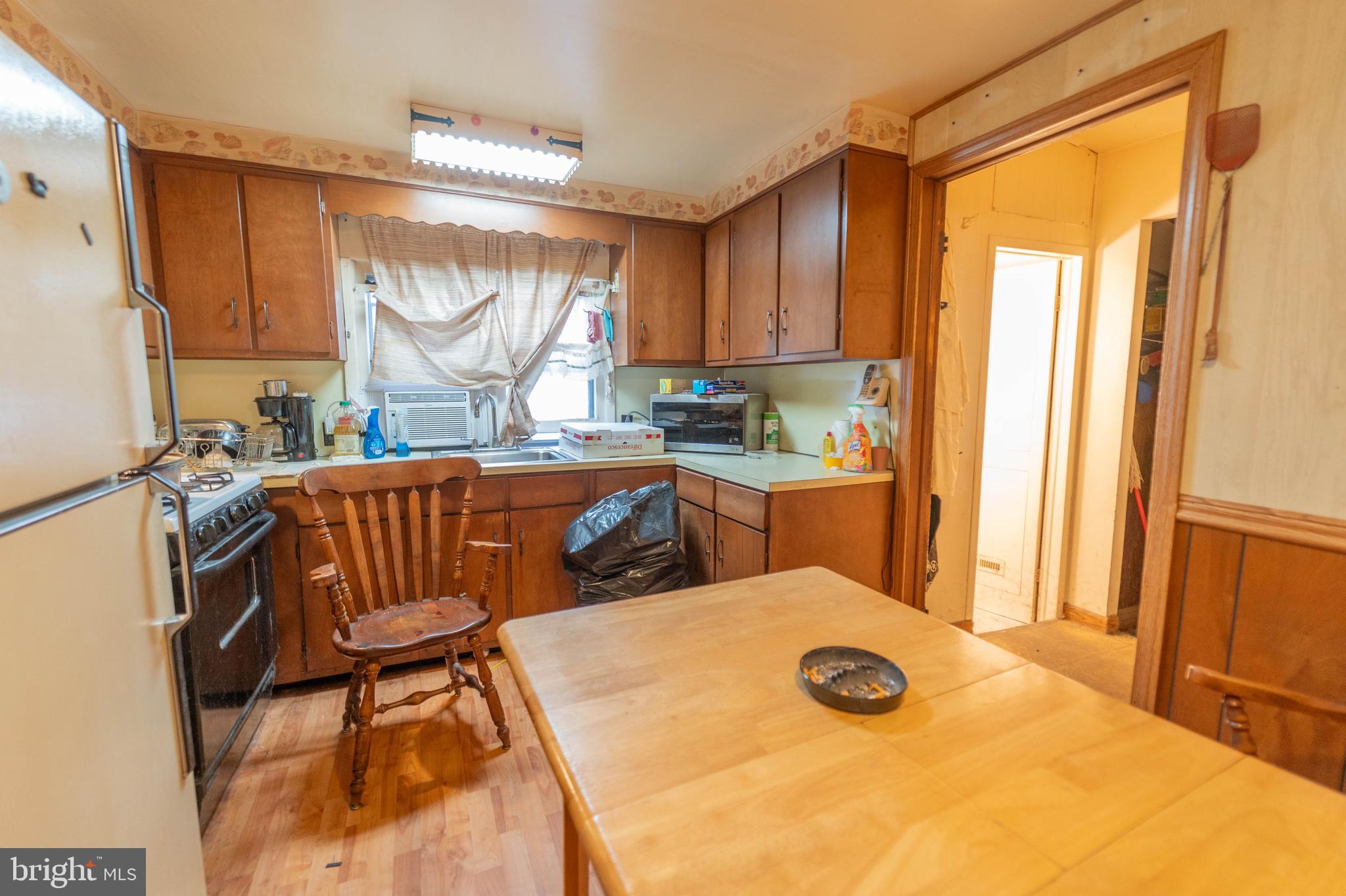 126 Olive Street Rancocas, NJ 08073 - Photo 6 of 12 a view of a dining room with furniture and a window