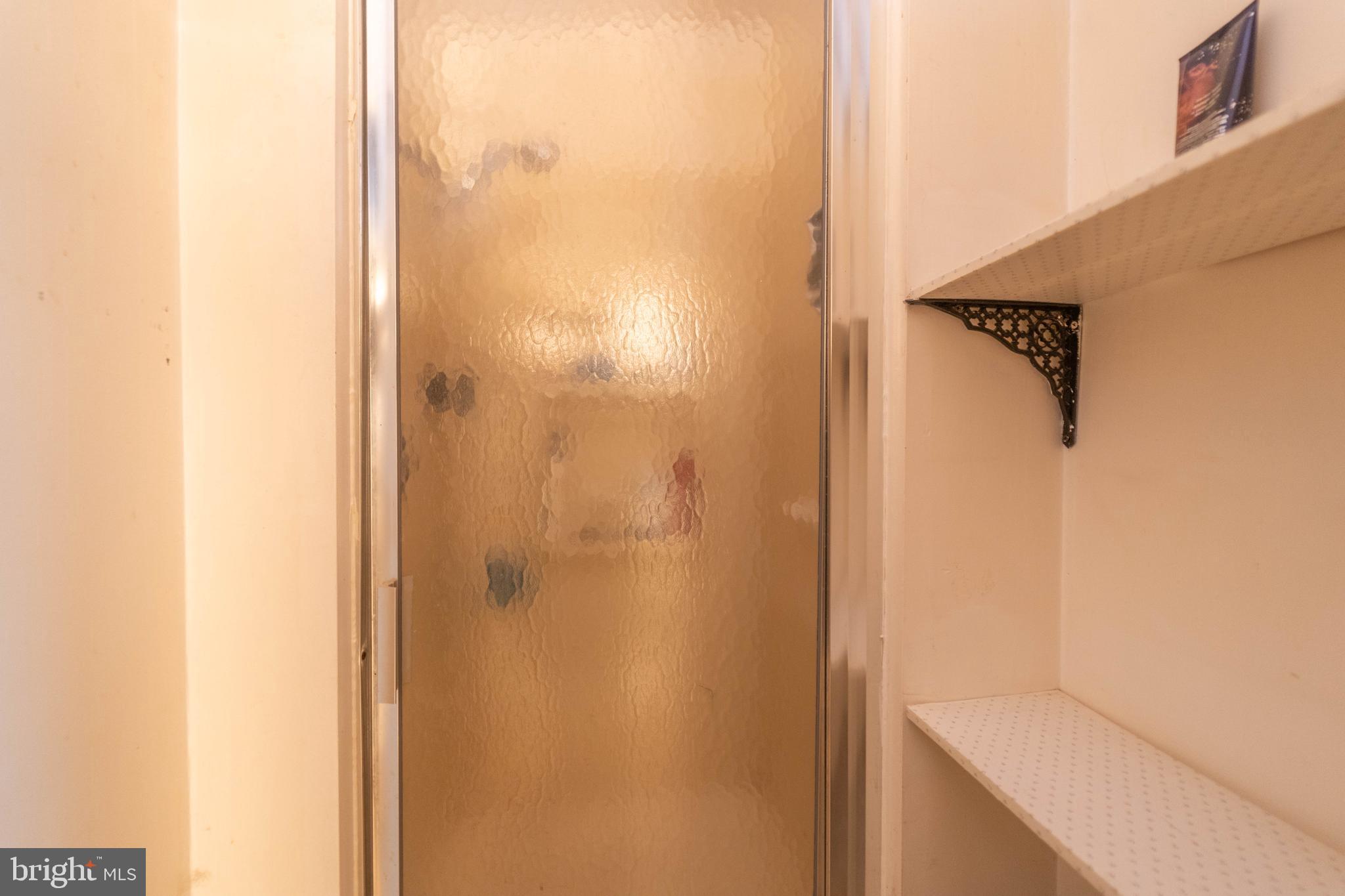 126 Olive Street Rancocas, NJ 08073 - Photo 8 of 12 a bathroom with a shower