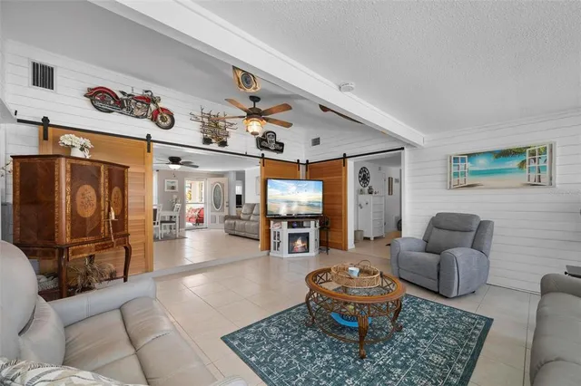 a bedroom with a bed and a workspace