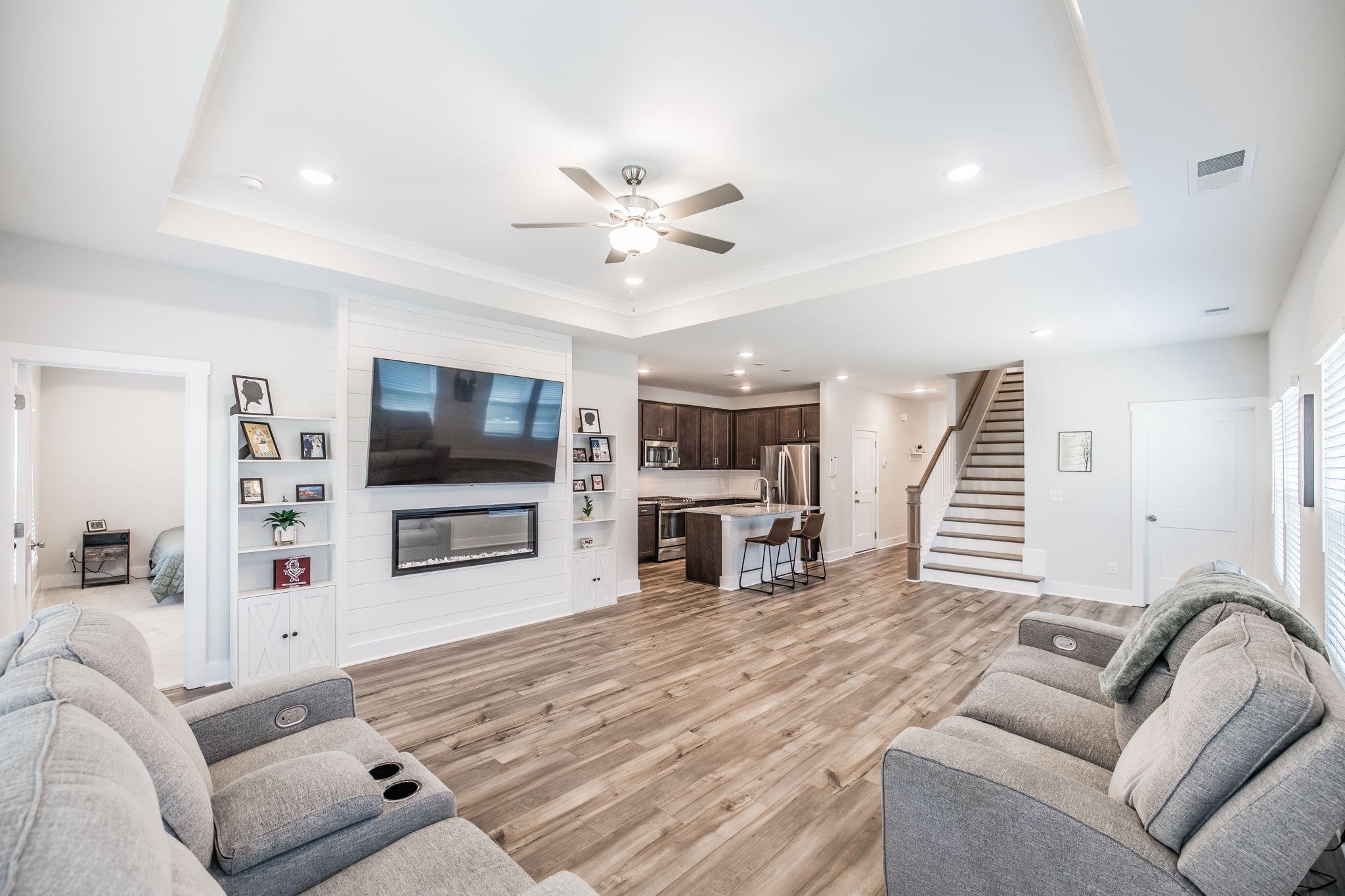137 Cavalcade Loop Gallatin, TN 37066 - Photo 14 of 57 a living room with furniture and a flat screen tv