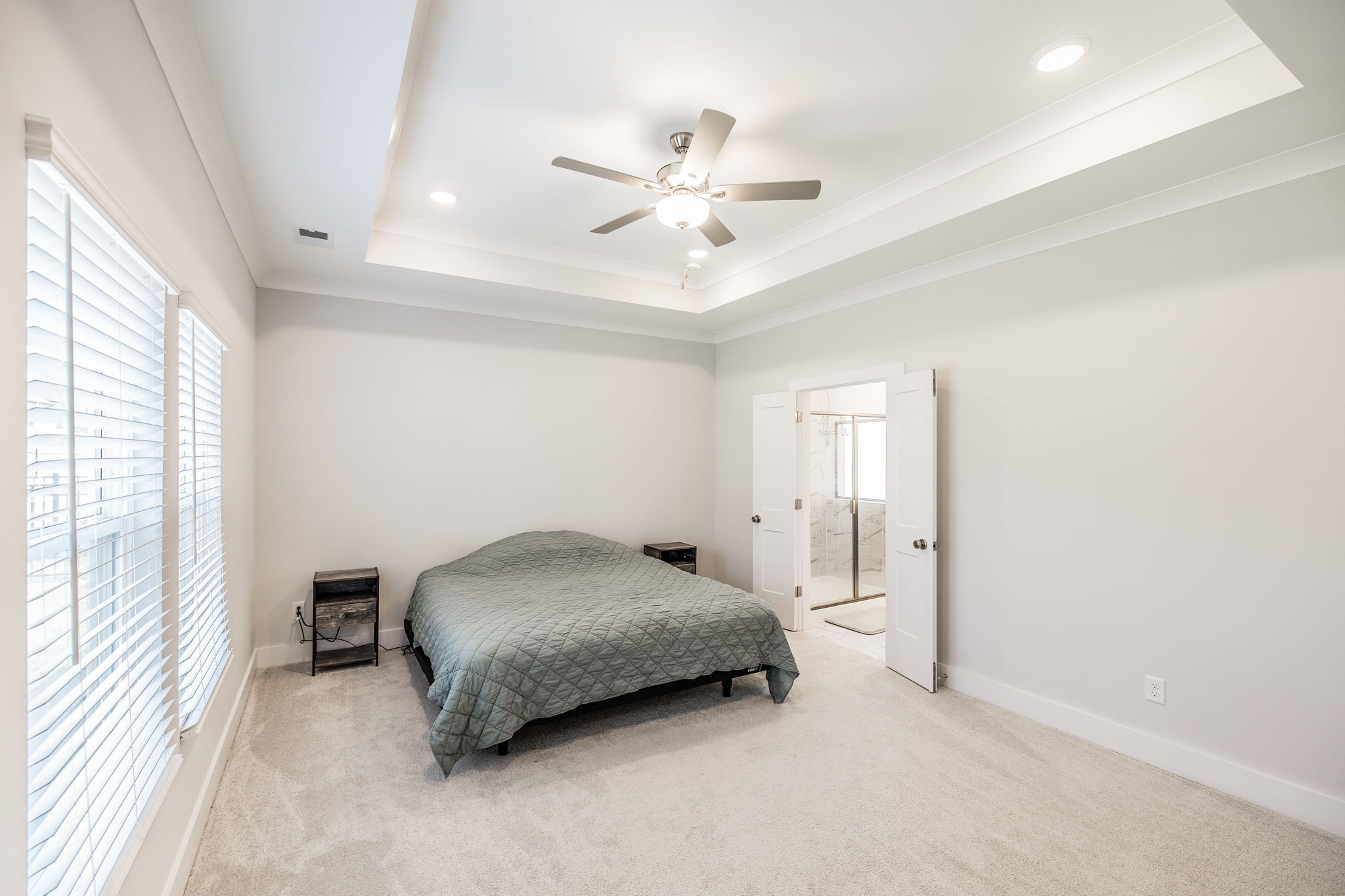 137 Cavalcade Loop Gallatin, TN 37066 - Photo 25 of 57 a bedroom with a bed and a ceiling fan