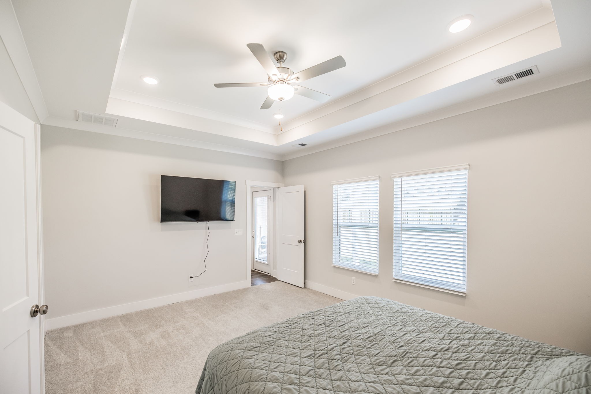 137 Cavalcade Loop Gallatin, TN 37066 - Photo 27 of 57 a bedroom with a bed and a flat screen tv
