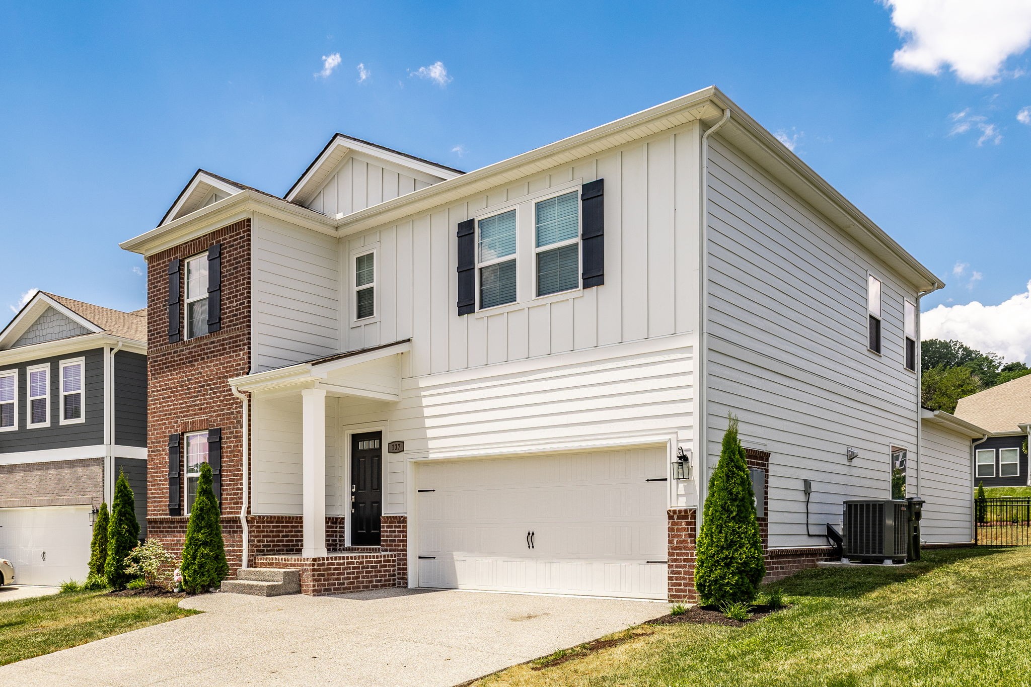 137 Cavalcade Loop Gallatin, TN 37066 - Photo 4 of 57 a view of a house with a yard
