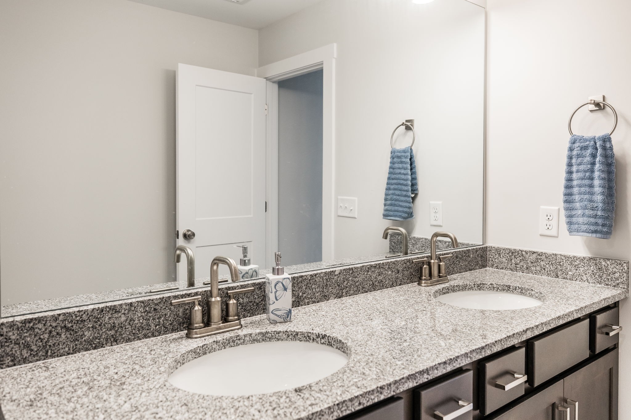 137 Cavalcade Loop Gallatin, TN 37066 - Photo 44 of 57 a bathroom with a granite countertop sink and a mirror