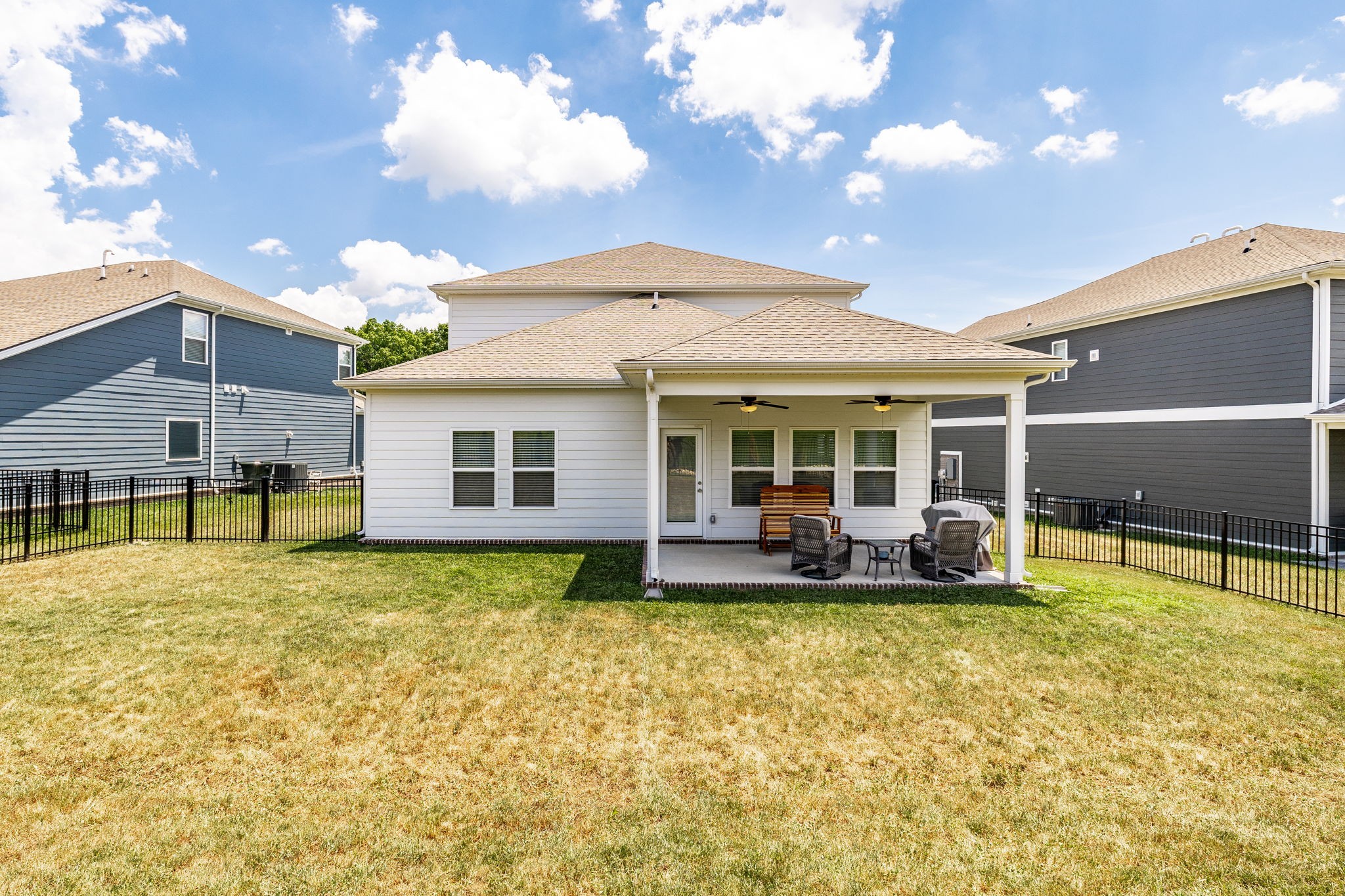 137 Cavalcade Loop Gallatin, TN 37066 - Photo 57 of 57 a view of a house with swimming pool and sitting area