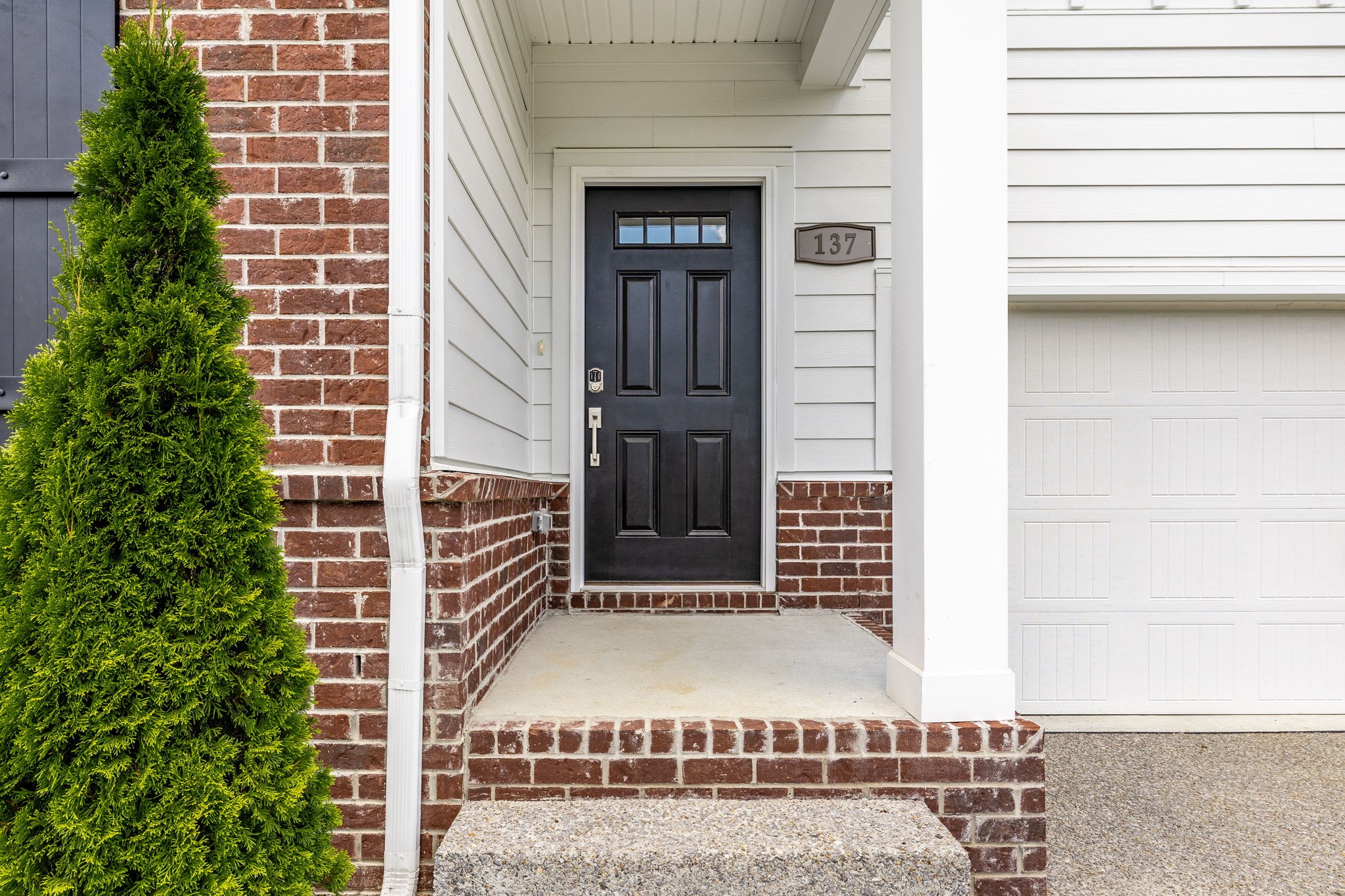 137 Cavalcade Loop Gallatin, TN 37066 - Photo 6 of 57 a view of entrance door of the house