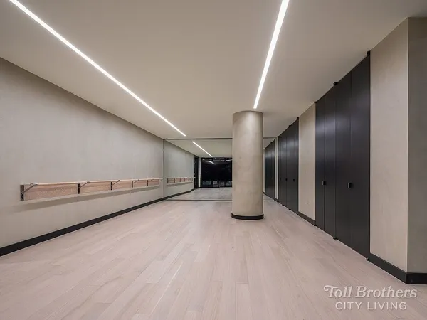 a media room with lots of chairs and a projector screen