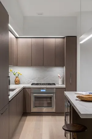 a kitchen with a appliances and cabinets