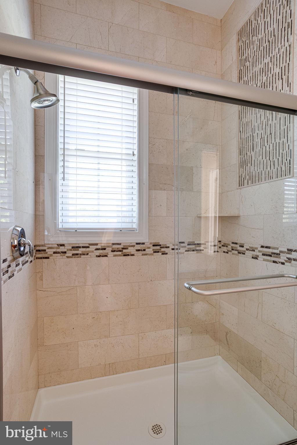 7111 Granberry Way Springfield, VA 22151 - Photo 13 of 84 Custom details tile work; ALL showers fully tiled!