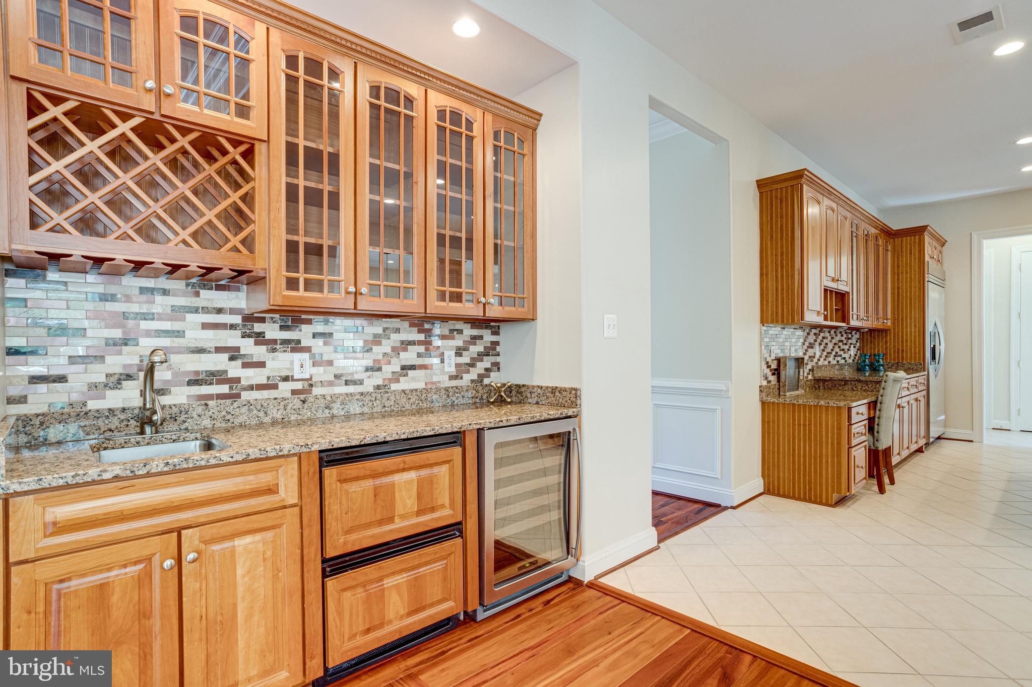 7111 Granberry Way Springfield, VA 22151 - Photo 17 of 84 Wet bar with double cooler drawers and wine fridge