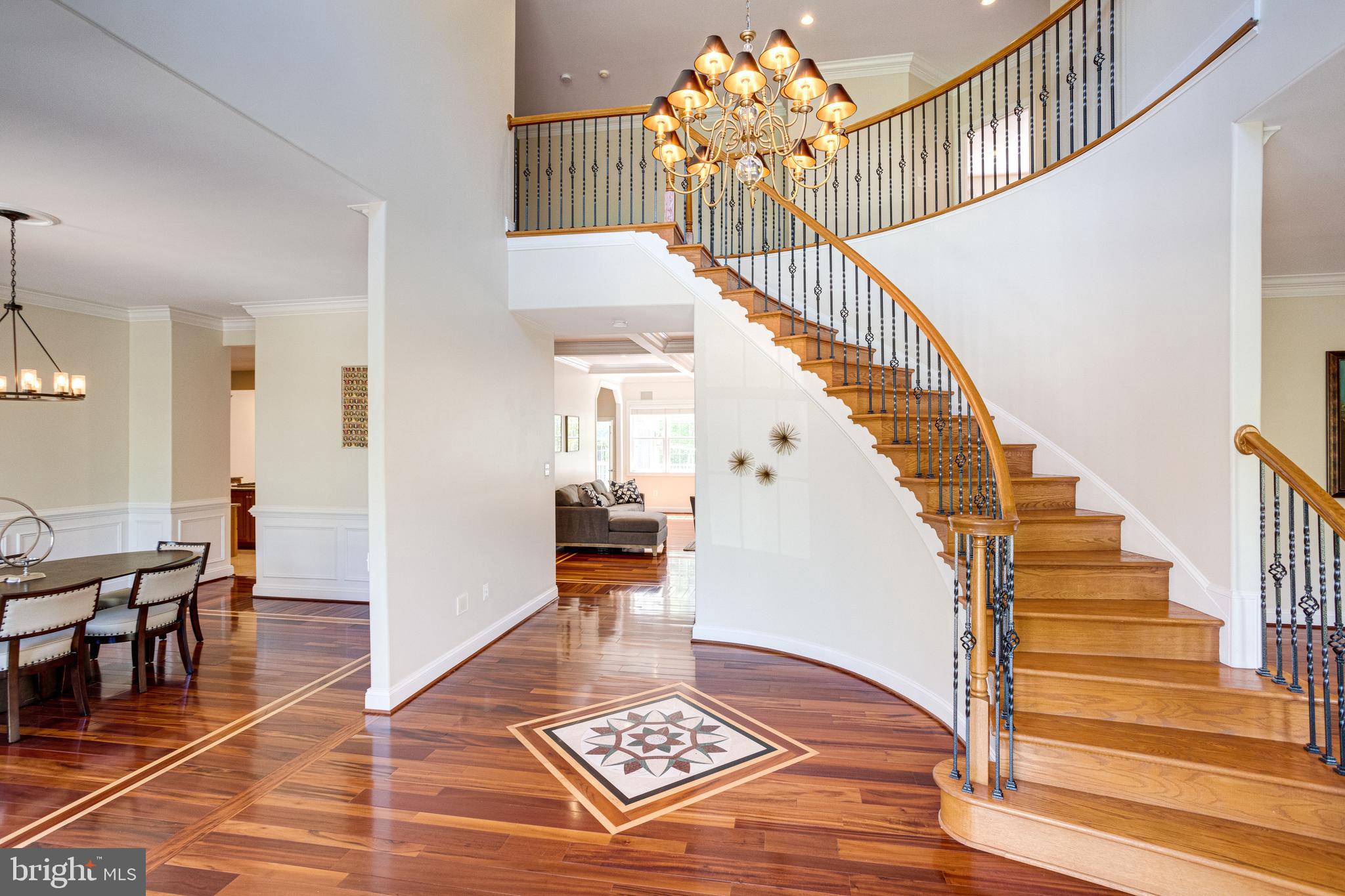 7111 Granberry Way Springfield, VA 22151 - Photo 5 of 84 and tantilizes them into the breathtaking foyer