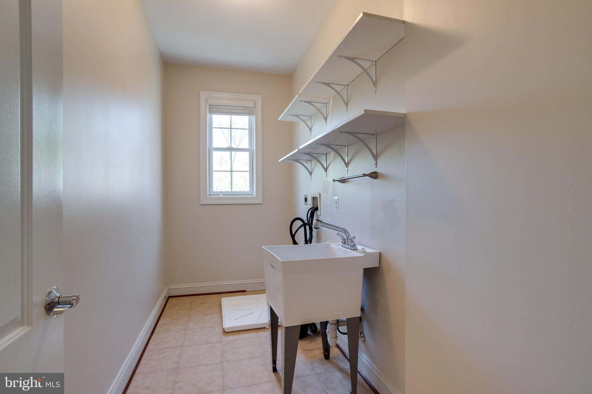 7111 Granberry Way Springfield, VA 22151 - Photo 50 of 84 Spacious 2nd floor laundry room! w/another in bsmt