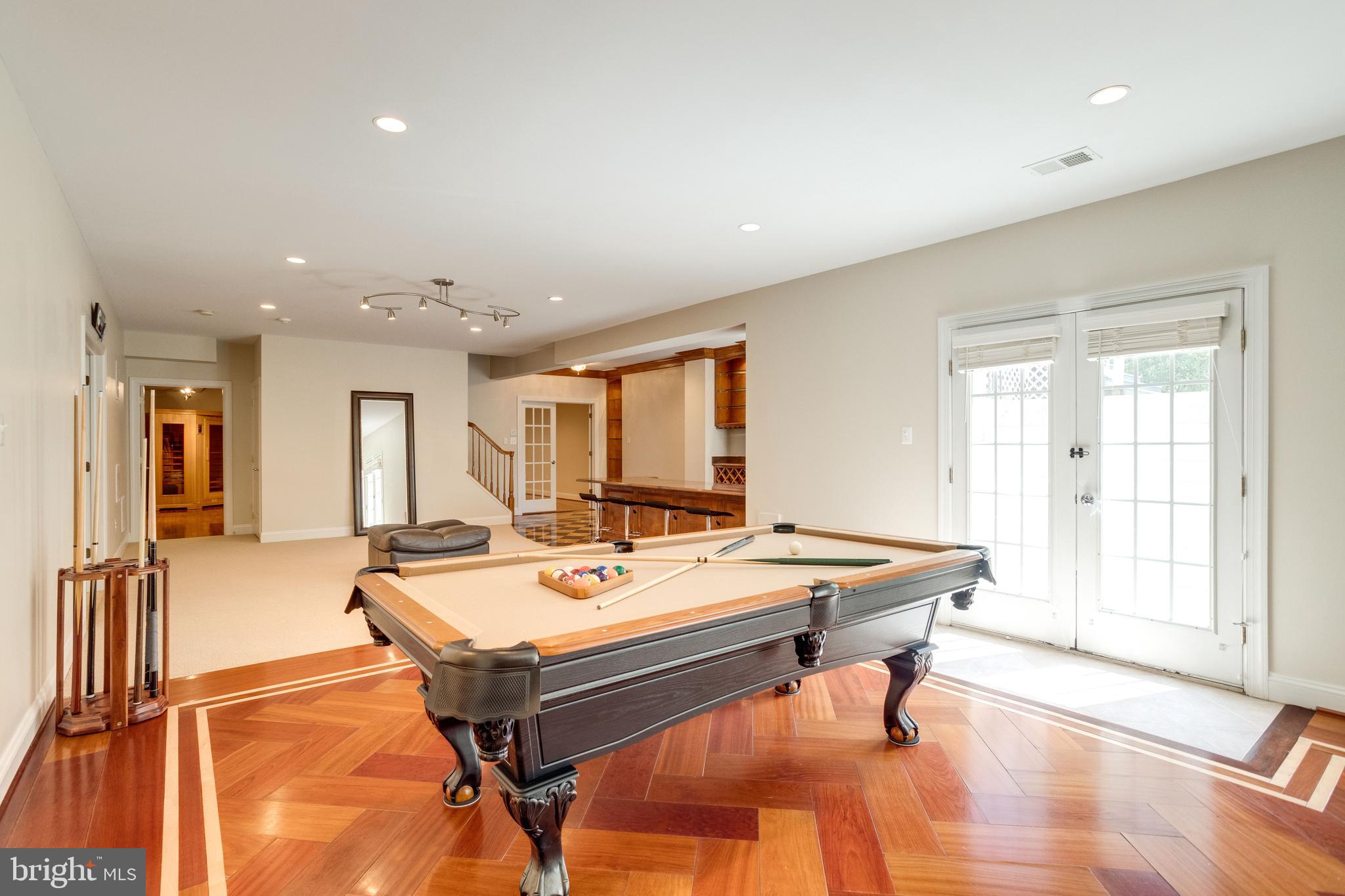 7111 Granberry Way Springfield, VA 22151 - Photo 62 of 84 Pool table fits perfectly on custom parque floor