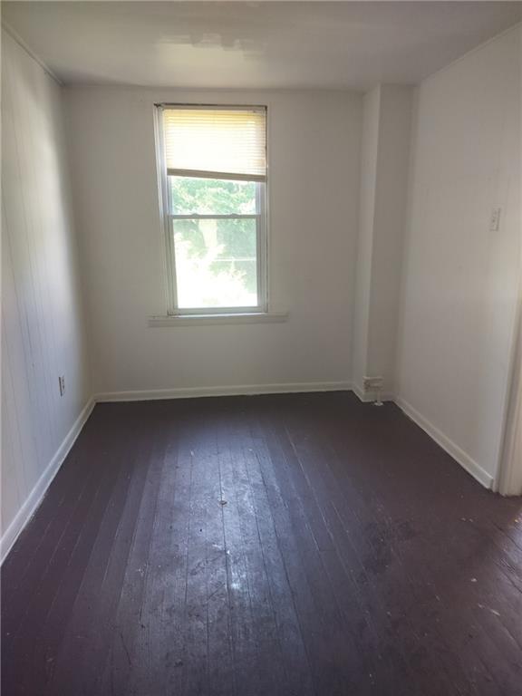 245 Fleet Street Braddock, PA 15104 - Photo 7 of 12 an empty room with a window