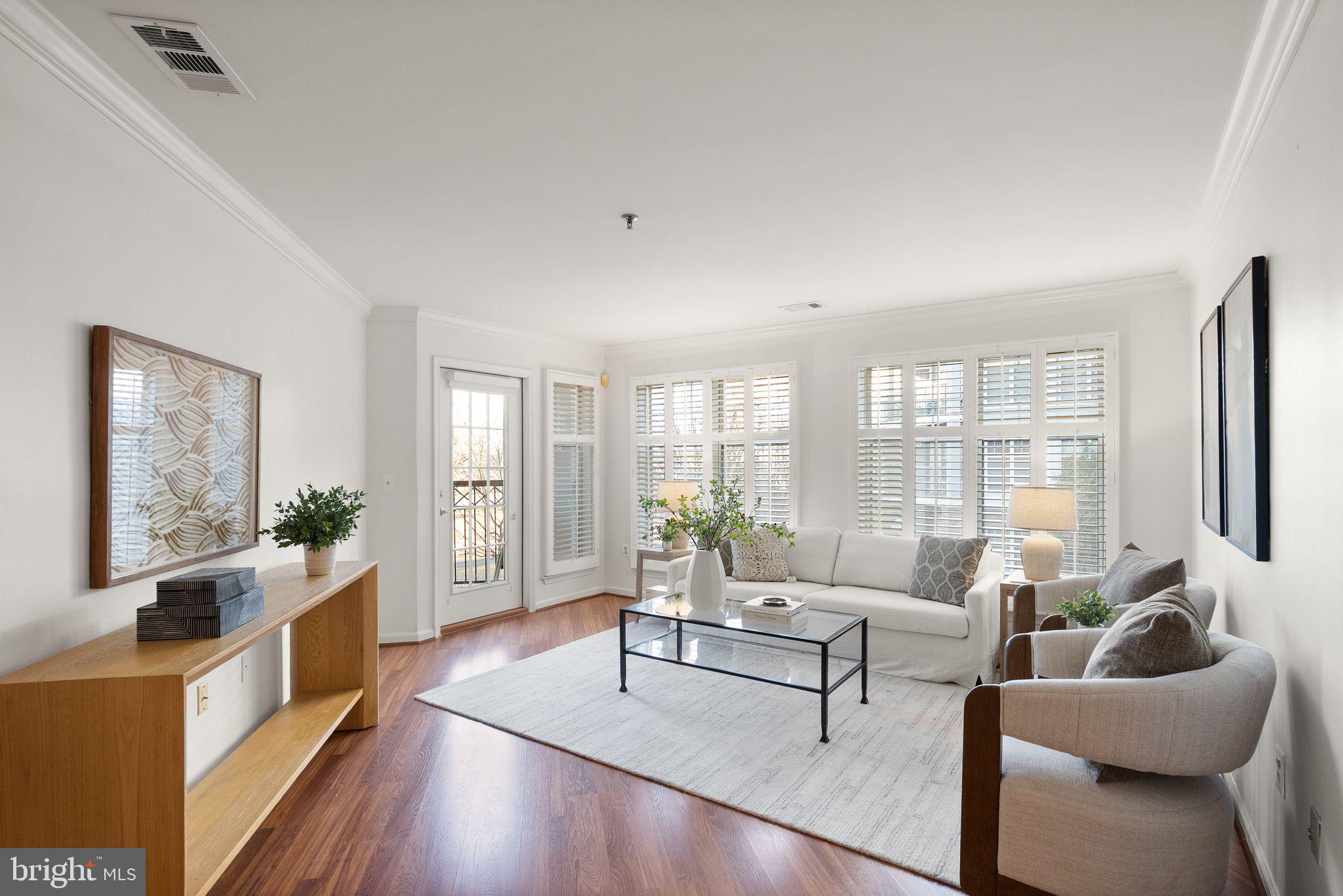 5565 Seminary Road, Unit 209 Falls Church, VA 22041 - Photo 11 of 34 a living room with furniture and a large window