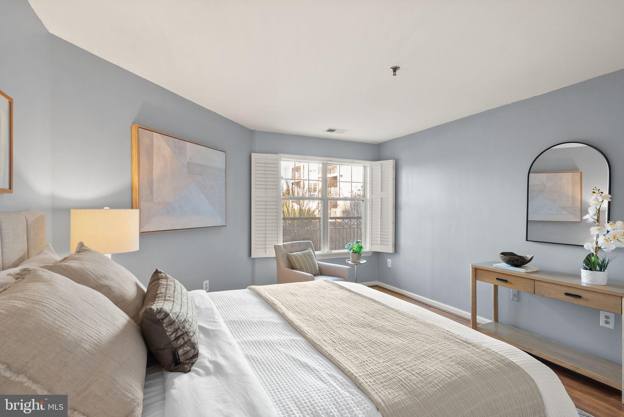 5565 Seminary Road, Unit 209 Falls Church, VA 22041 - Photo 15 of 34 a bedroom with a bed and a window