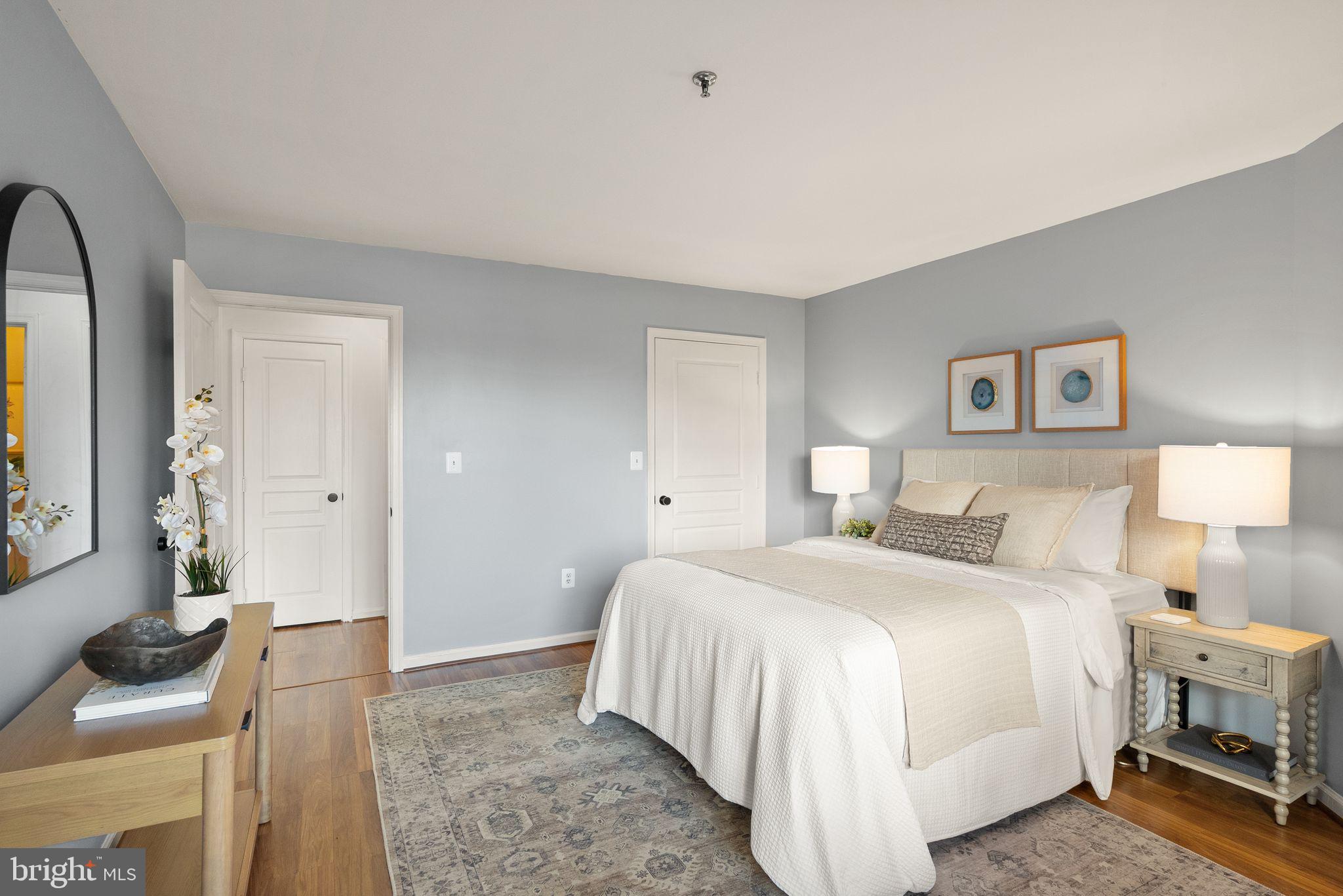 5565 Seminary Road, Unit 209 Falls Church, VA 22041 - Photo 16 of 34 a bedroom with a bed and a couch