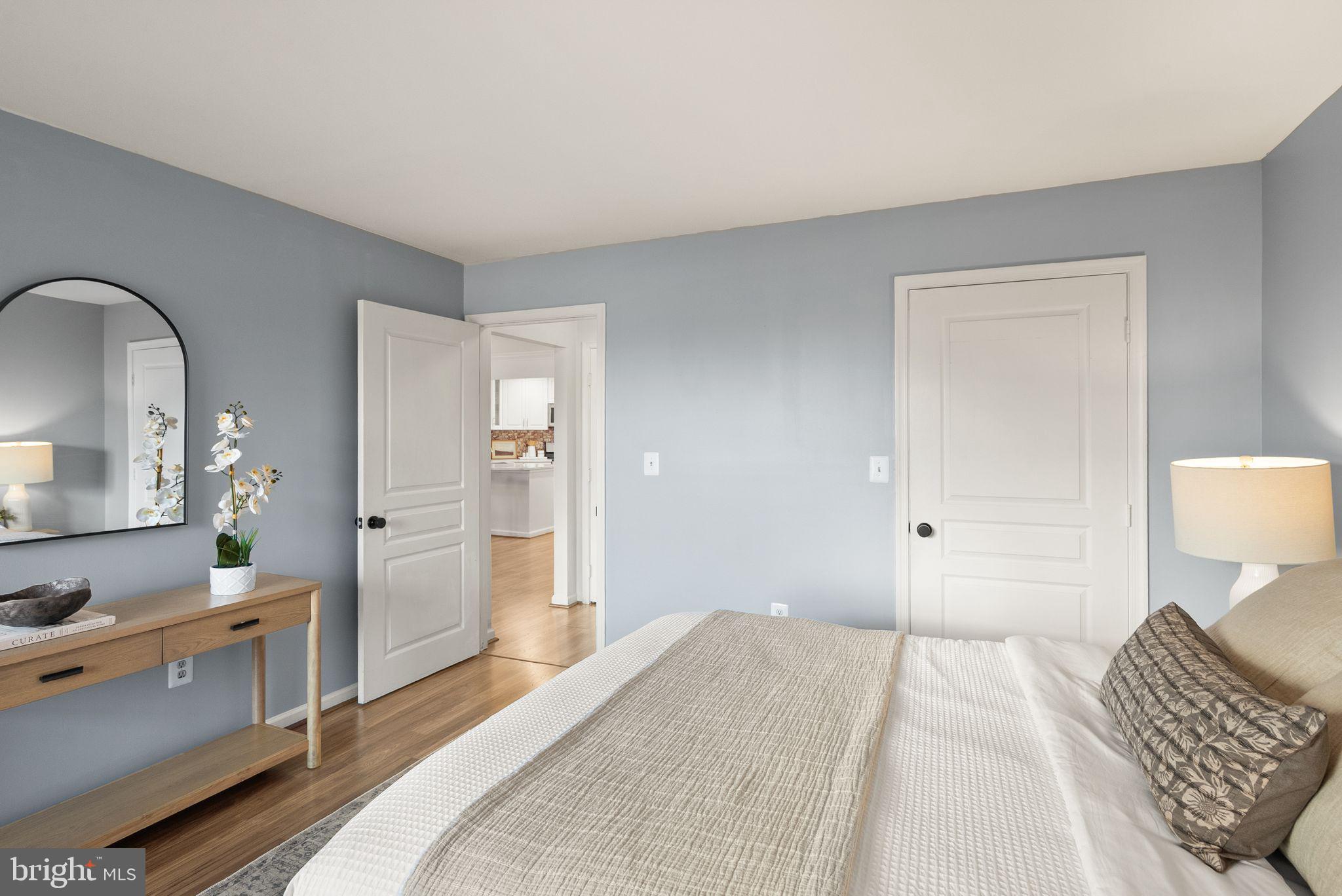 5565 Seminary Road, Unit 209 Falls Church, VA 22041 - Photo 17 of 34 a bedroom with a bed and a dresser in it