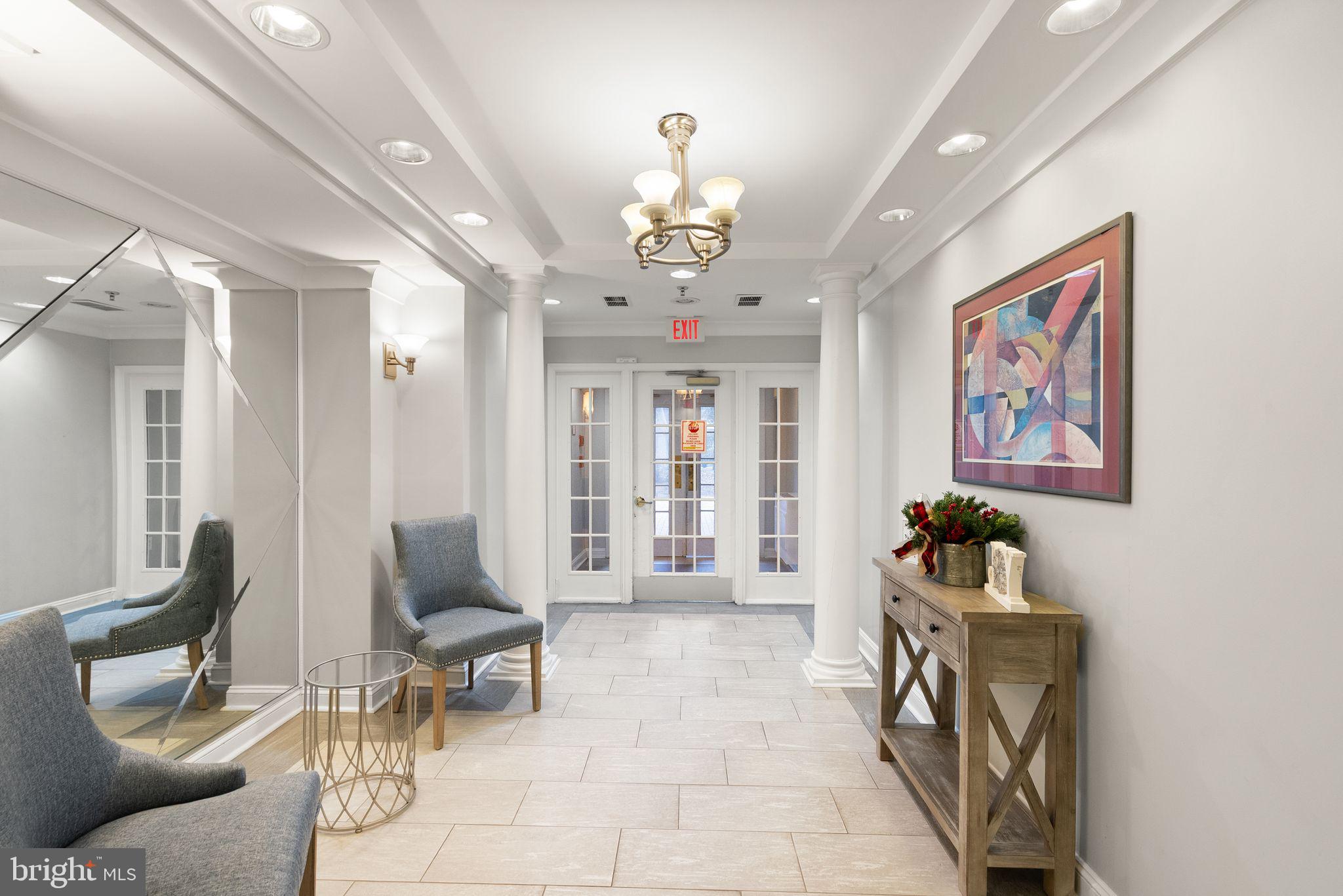 5565 Seminary Road, Unit 209 Falls Church, VA 22041 - Photo 30 of 34 a living room with furniture and large windows