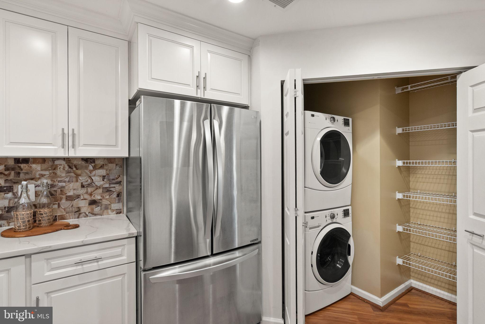 5565 Seminary Road, Unit 209 Falls Church, VA 22041 - Photo 7 of 34 a utility room with dryer and washer