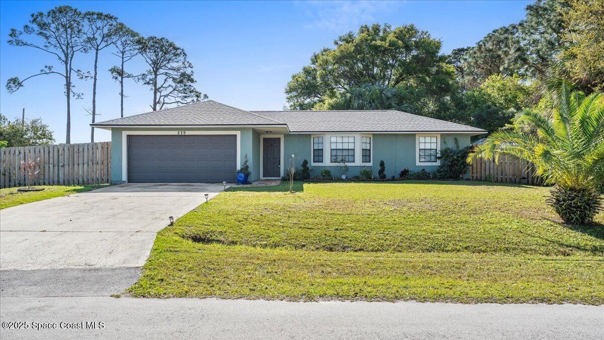 529 Wicker Road Southwest Palm Bay, FL 32908 - Photo 1 of 19 02-Exterior Front