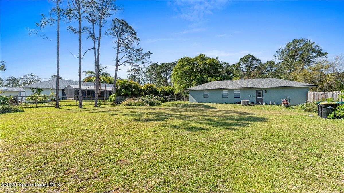 529 Wicker Road Southwest Palm Bay, FL 32908 - Photo 3 of 19 19-Exterior Back