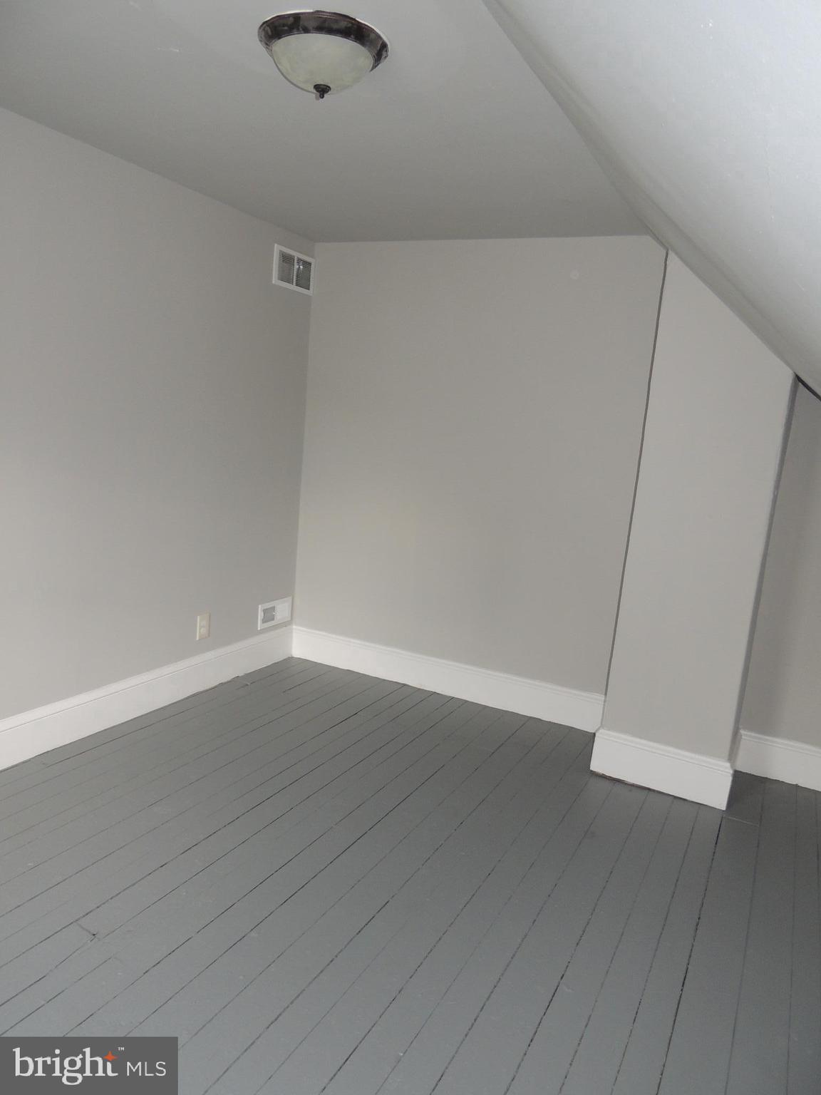 217 Broad Street Swedesboro, NJ 08085 - Photo 11 of 14 wooden floor in an empty room