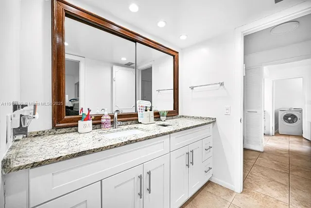 a bathroom with a toilet and a bathtub
