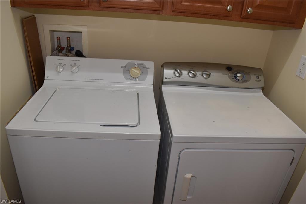 1311 Corso Palermo Court, Unit 2 Naples, FL 34105 - Photo 11 of 15 a utility room with dryer and washer