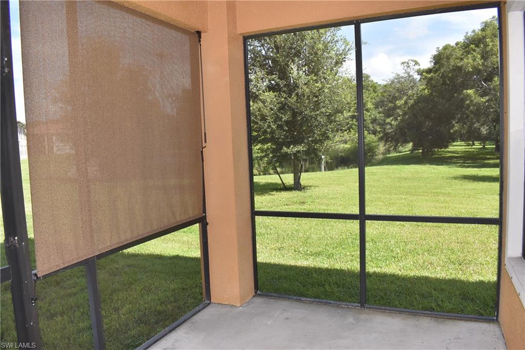 1311 Corso Palermo Court, Unit 2 Naples, FL 34105 - Photo 15 of 15 a view of a room with yard from a window