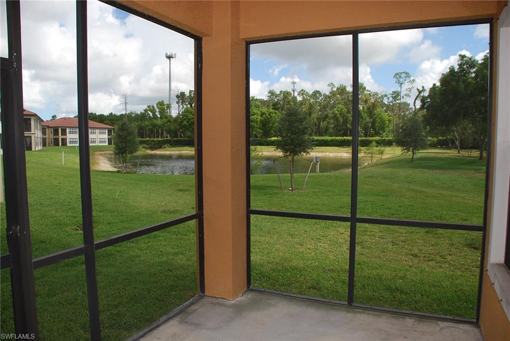 1311 Corso Palermo Court, Unit 2 Naples, FL 34105 - Photo 6 of 15 a view of a glass door