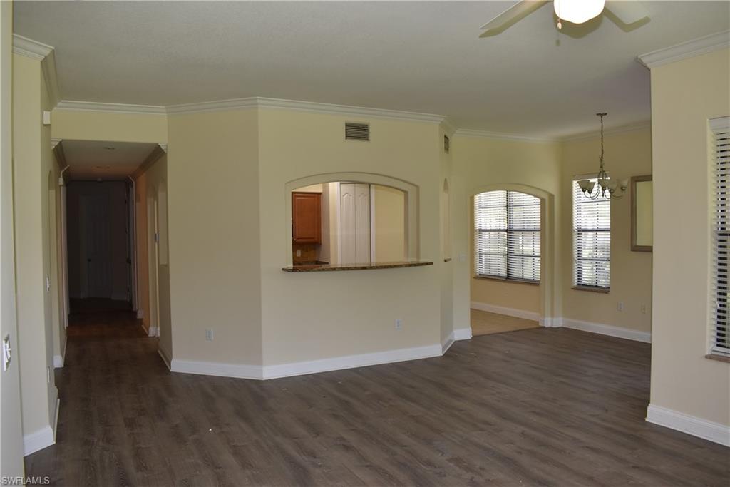 1311 Corso Palermo Court, Unit 2 Naples, FL 34105 - Photo 8 of 15 a view of empty room with wooden floor