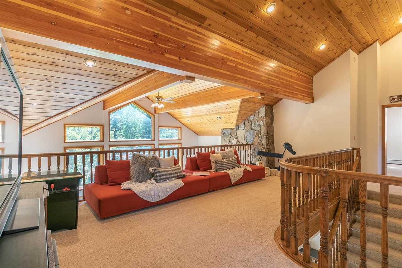 1722 Grouse Ridge Road Truckee, CA 96161 - Photo 7 of 21 a balcony with couch and chairs