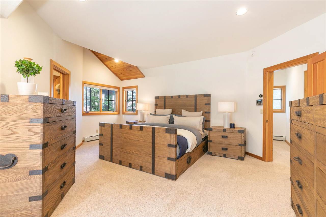 1722 Grouse Ridge Road Truckee, CA 96161 - Photo 9 of 21 a bed room with a bed and a dresser