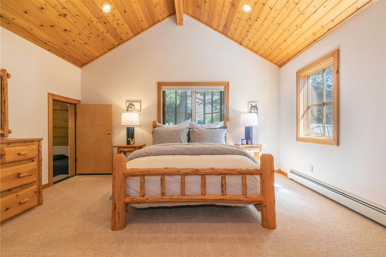 1722 Grouse Ridge Road Truckee, CA 96161 - Photo 10 of 21 a bedroom with a bed dresser and a window