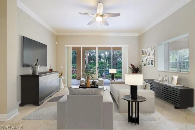 a living room with furniture and a table