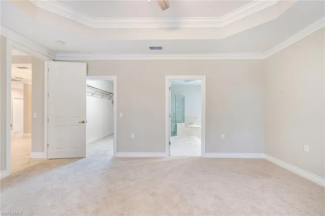 a bathroom with a bathtub shower sink mirror and toilet